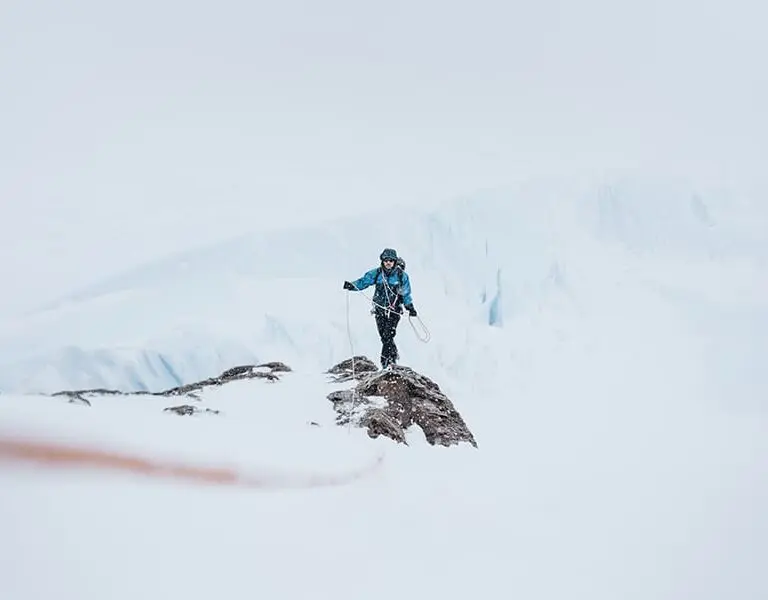 Summit icy peaks like a true explorer.