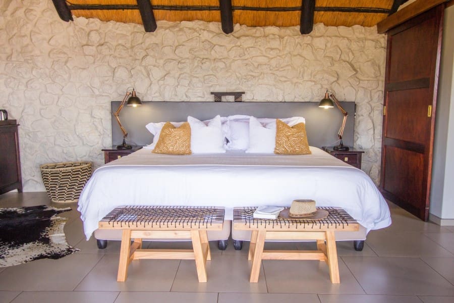 A king-sized bed invites you to a blissful night's sleep.