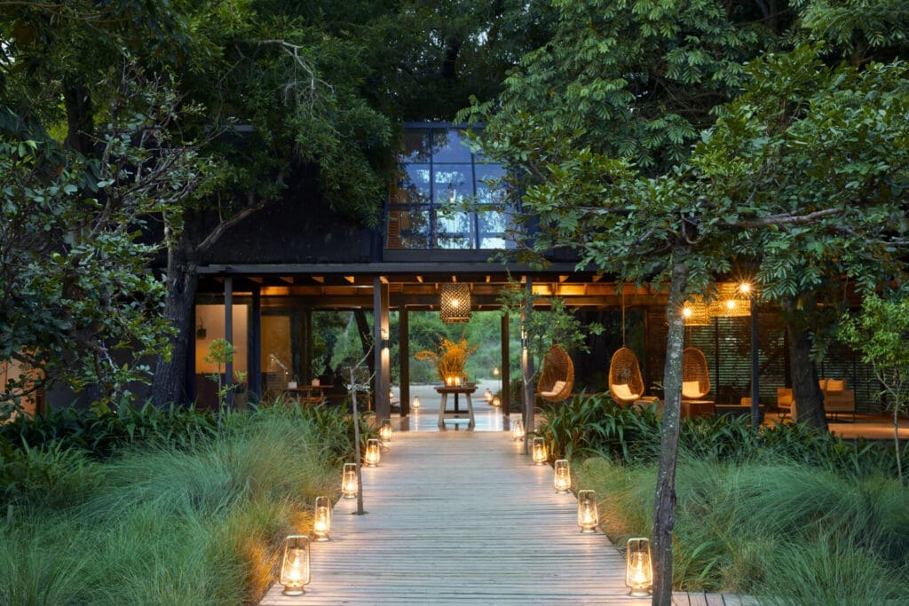 Picture: Lion Sands River Lodge entry walkway, lit up in the evening