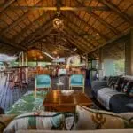 A spacious lounge and bar area invites you to unwind with an afternoon drink and lively conversation with fellow guests.