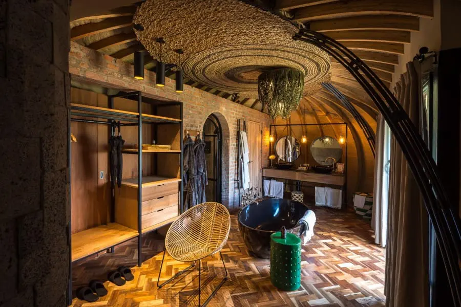A free-standing bath beckons you to a luxurious soak.