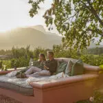 Sip on award-winning wines and admire the sun setting over the valley. 
