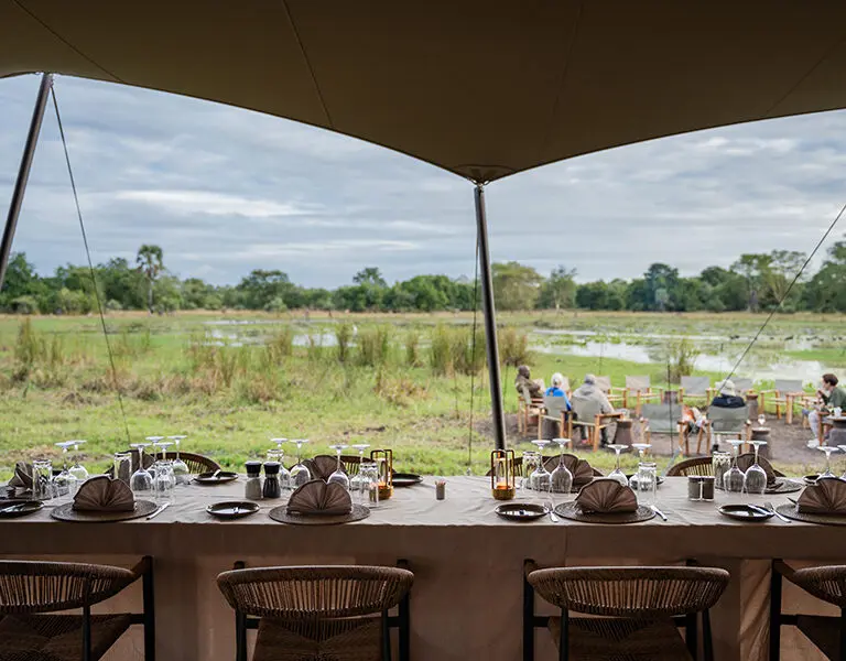Dine with a view of the pan and the possibility of spotting passing wildlife.