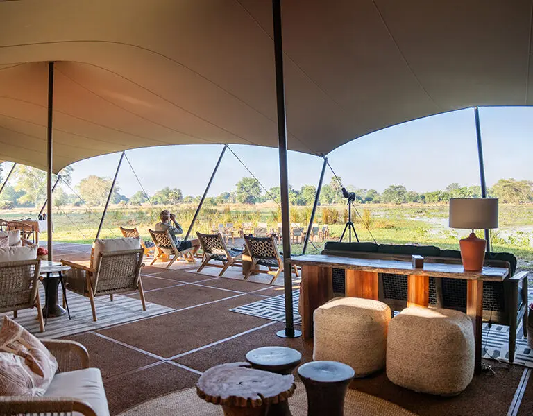gorongosa-safaris-chicari-camp-main-area-interior-out-to-pan-view-44