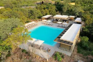 Take a dip in the pool and sip on a drink, relaxing on the loungers.