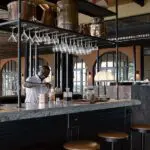 Order a cocktail or coffee from the bar. 