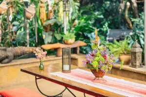 A long dining table invites convival meals with fellow guests.
