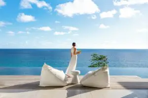 Sip on a glass of wine as you soak in panorama views of the Indian Ocean from your private deck. 