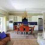 The kitchen welcomes family meals.