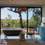 Take a luxurious soak in the bathtub with a view.