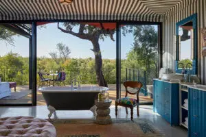 Take a luxurious soak in the bathtub with a view.