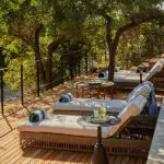 Relax on the pool deck. 