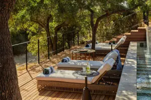 Relax on the pool deck. 
