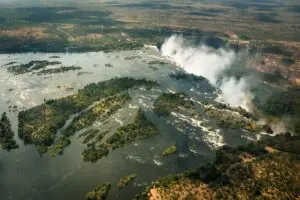 Visit the iconic Victoria Falls. 