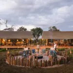 The firepit and lounge exterior at Nkasa Linyanti.