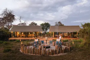 The firepit and lounge exterior at Nkasa Linyanti.