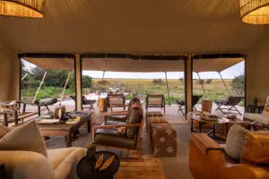 The lounge and deck at Nkasa Linyanti.
