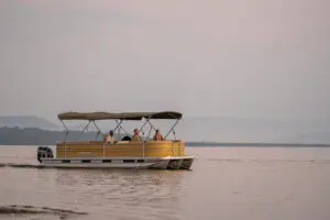 Enjoy cruises on a barge on Lake Rwanyakazinga. 