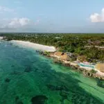 A beachside retreat welcomes you to explore the ocean.