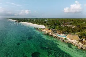 A beachside retreat welcomes you to explore the ocean.