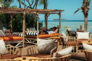 Relax on a day bed, falling asleep to the sounds of the ocean.