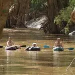 Hop aboard a tube or kayak and make your way down the river.