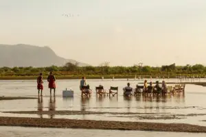 Savour sundowners in the river.