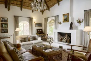 Savour a night cap by the fireplace.