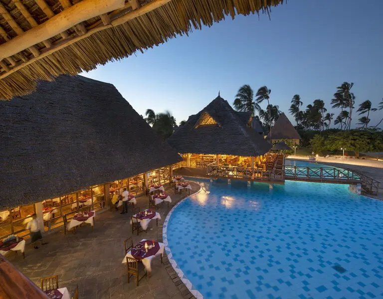 Savour evening poolside dining.
