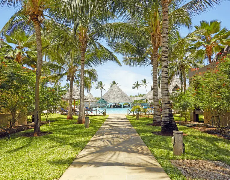 Neptune Pwani invites you to relax in a tropical beach paradise.