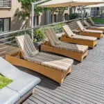 Sun loungers line the pool.