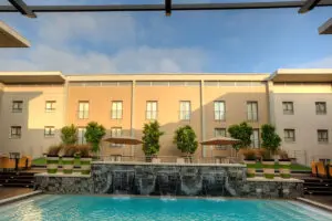 With a swimming pool to relax next to or dip into. 