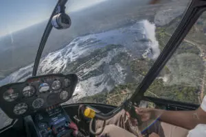 Helicopter flying over Victoria Falls from Zimbabwe