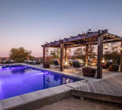 Enjoy a sunset dip in the pool.