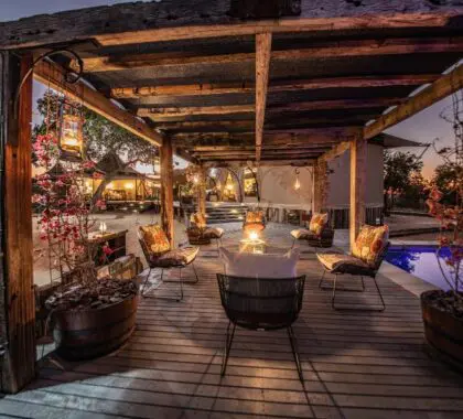 Sip on sundowners beside the swimming pool. 