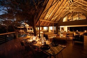 Savour homecooked meals under the African night sky. 