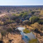 Enjoy an intimate safari overlooking a private waterhole.