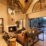 Relax by the crackling fireplace between activities.