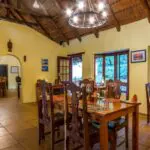 Gather for breakfast and dinner in the dining room.