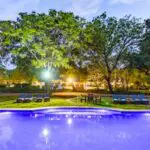 Cool off with a dip in the large swimming pool.