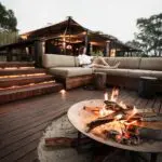 Gather by the firepit each evening.
