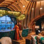 Grab a drink from the fully stocked bar.