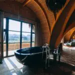 Enjoy a soak in your bath overlooking the wilderness.