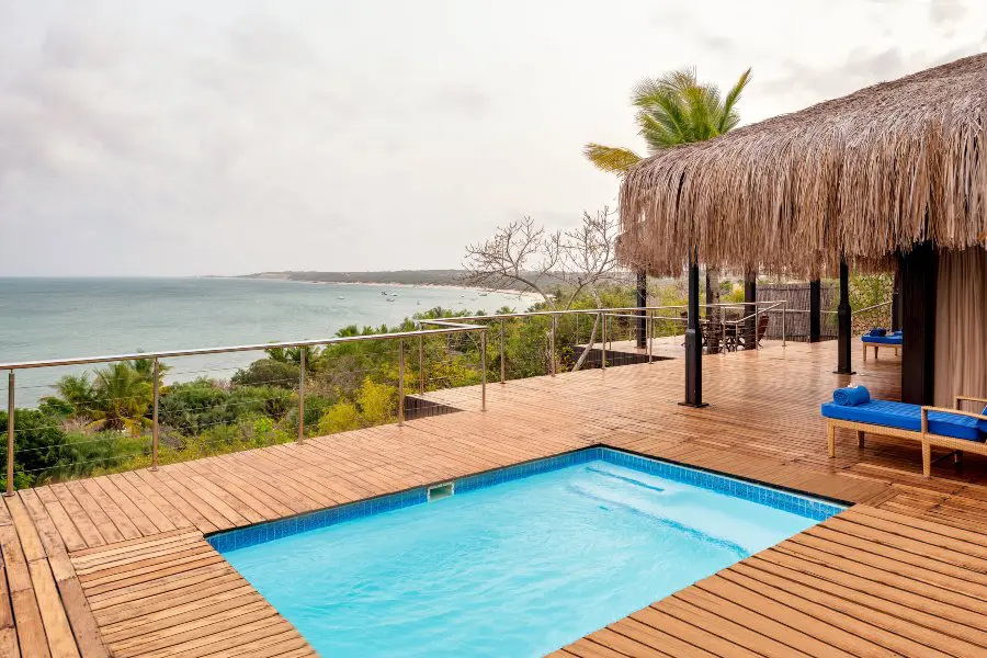 Private swimming pool and wooden deck overlooking the Mozambique coast | Go2Africa