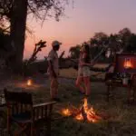 Gather around the fire at sunset.
