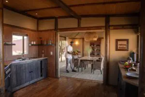 The suite has its own private kitchen and dining area.