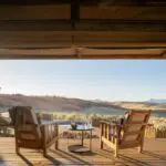 Reflect on the day's adventures on your private deck.