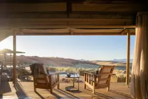 Reflect on the day's adventures on your private deck.