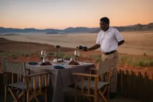 Savour a romantic dinner overlooking the desert.