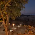 Savour firelit dinners in the boma.